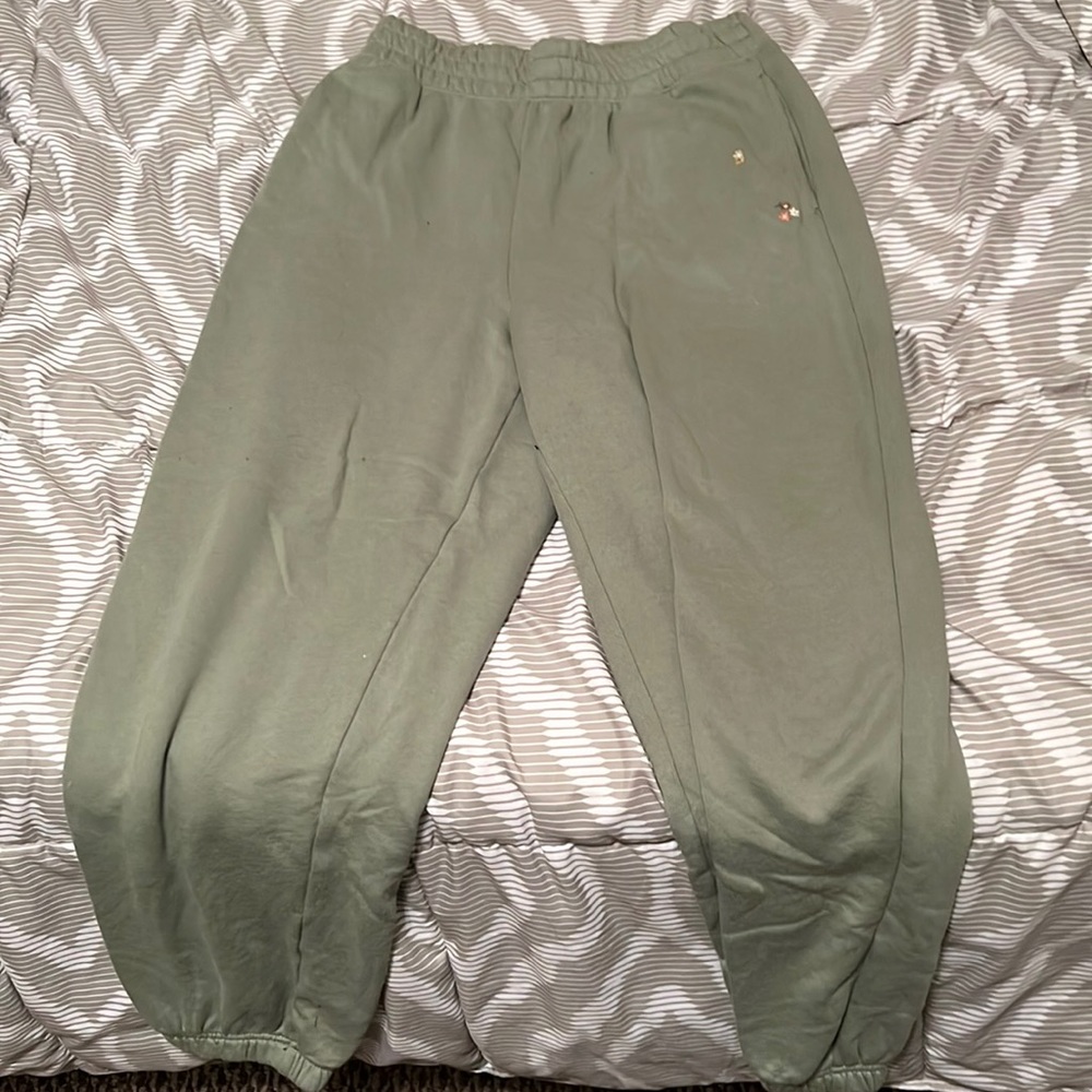 green sweatpants